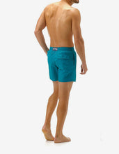 Load image into Gallery viewer, Prussian Blue Turtle Embroidery Motu Swim Shorts
